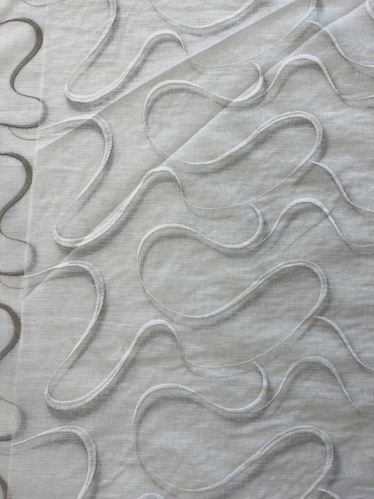 Glass curtain embroidered with waves in white, grey, beige and blue